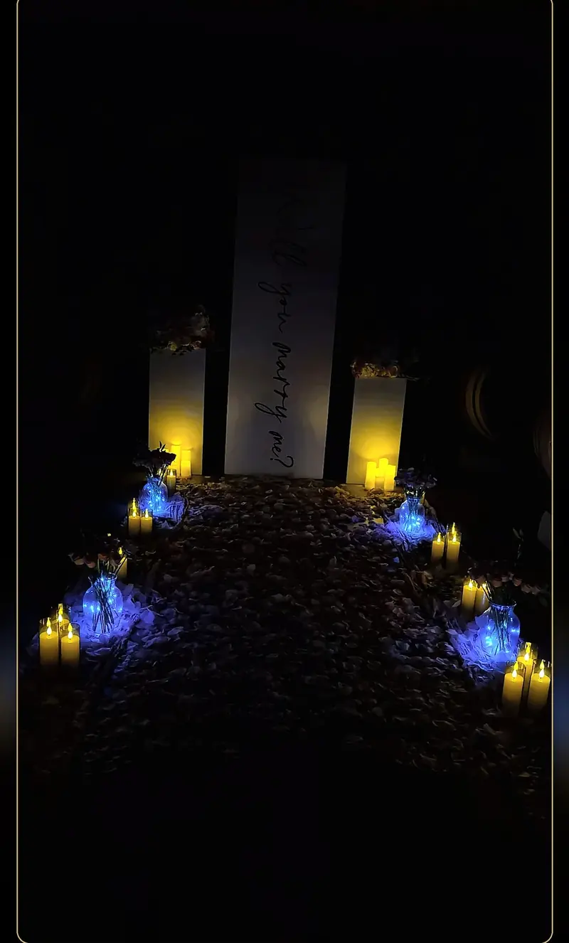 Candlelit proposal details in the evening